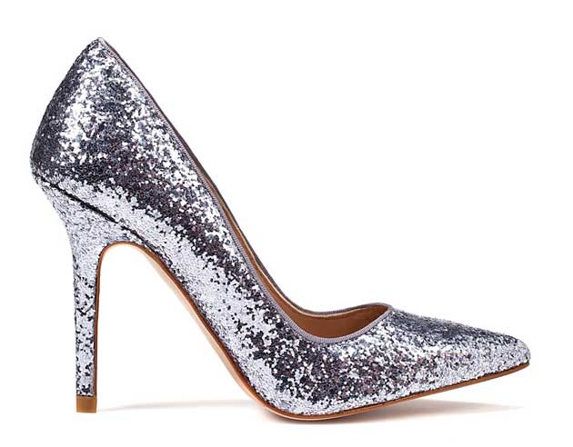 Single silver glitter high-heeled shoe on a plain white background, glamorous and sparkling mood